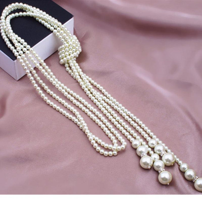 "Strings of Pearls" Double-Knotted Long Pearl Tassel Necklace